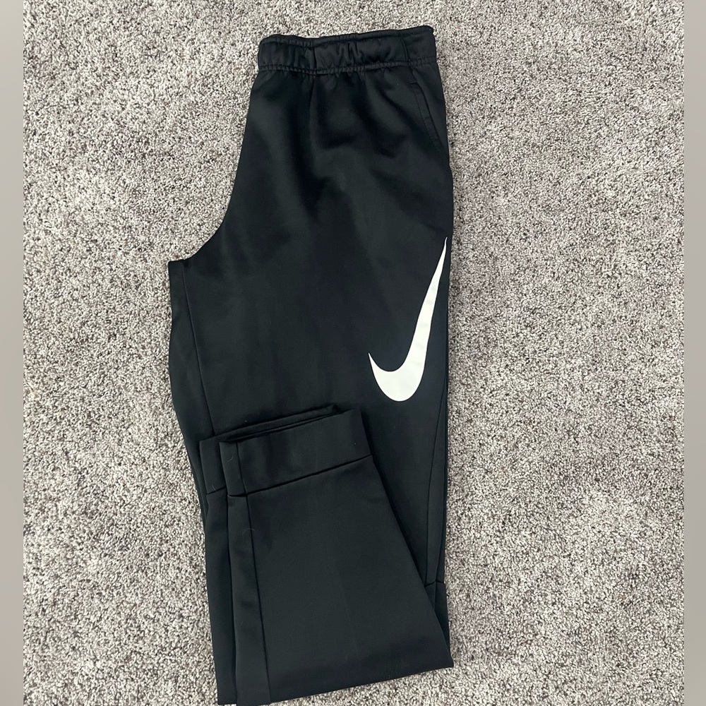 Black nike joggers w/ big nike swoosh on one leg